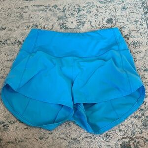 lulu speed up high-rise lined shorts 2.5” kayak light blue size 4
